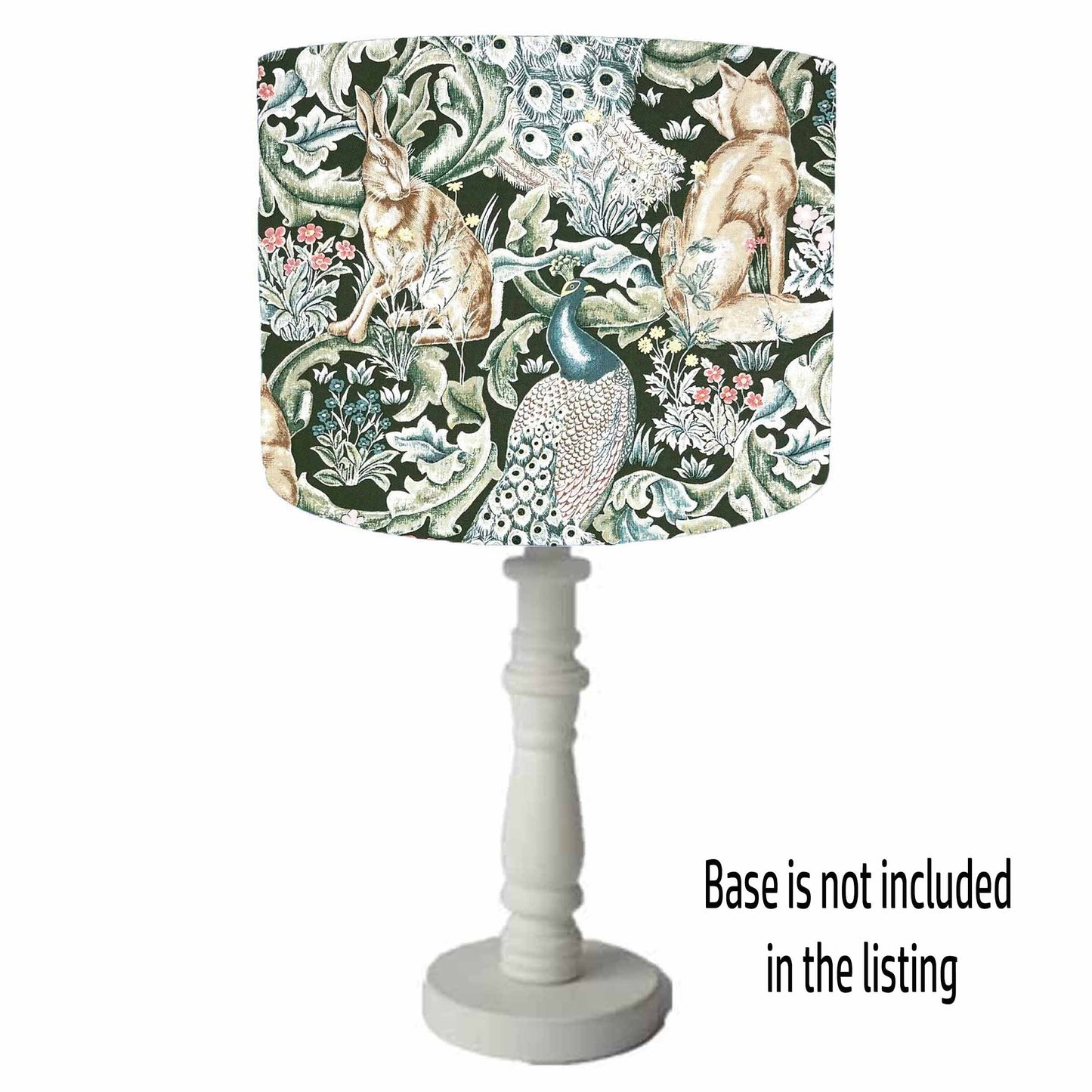 Decorative drum table lamp shade with a nature-themed shade on a white background