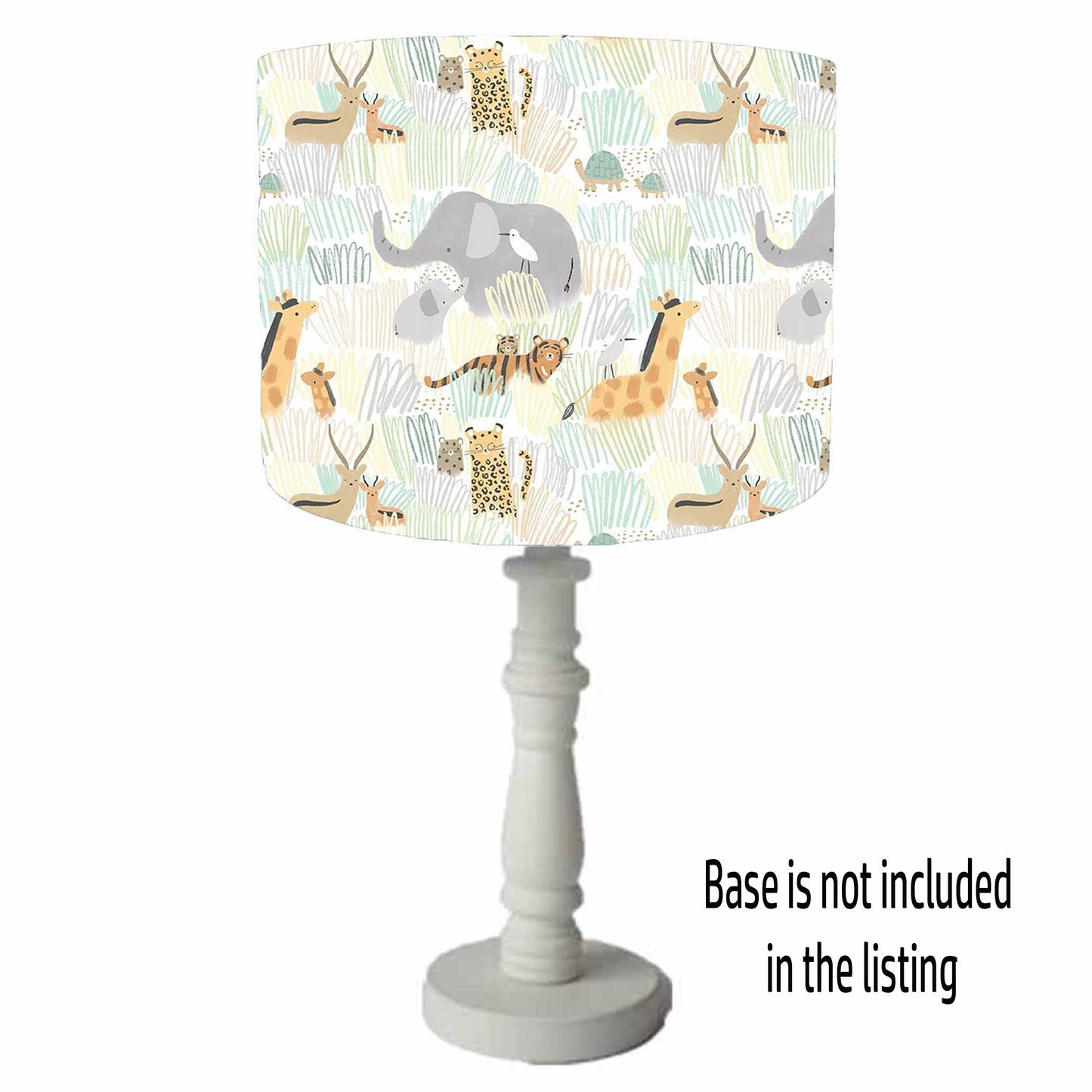 A safari animals themed drum lampshade. With different jungle animals set on a grassland background. Table lamp shade view.