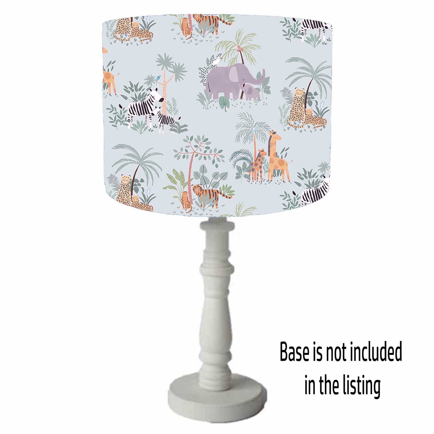 Pale blue drum lampshade with elephants, zebras, tigers and giraffe. Table lamp view.