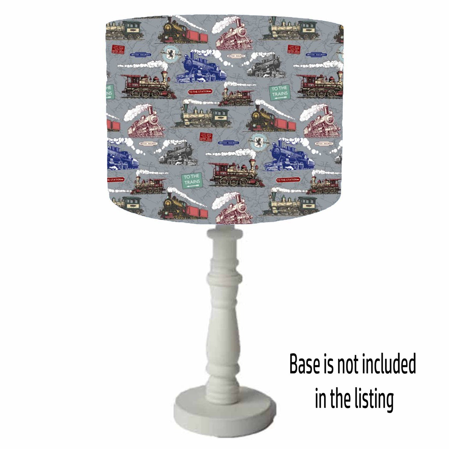 grey table lamp shade with colourful steam trains