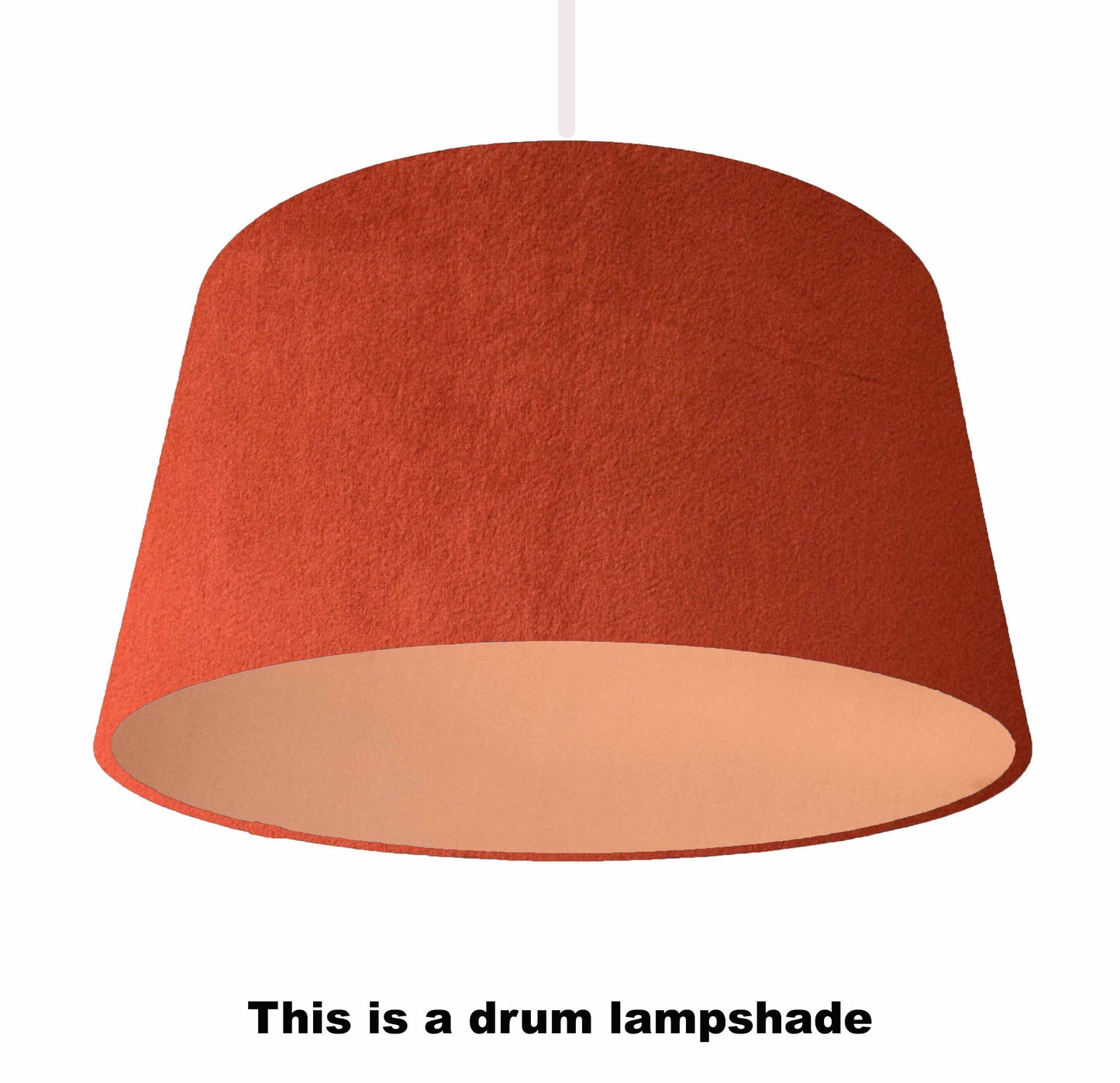 Orange and copper drum lampshade. Velvet lamp shade. From a ceiling light perspective.