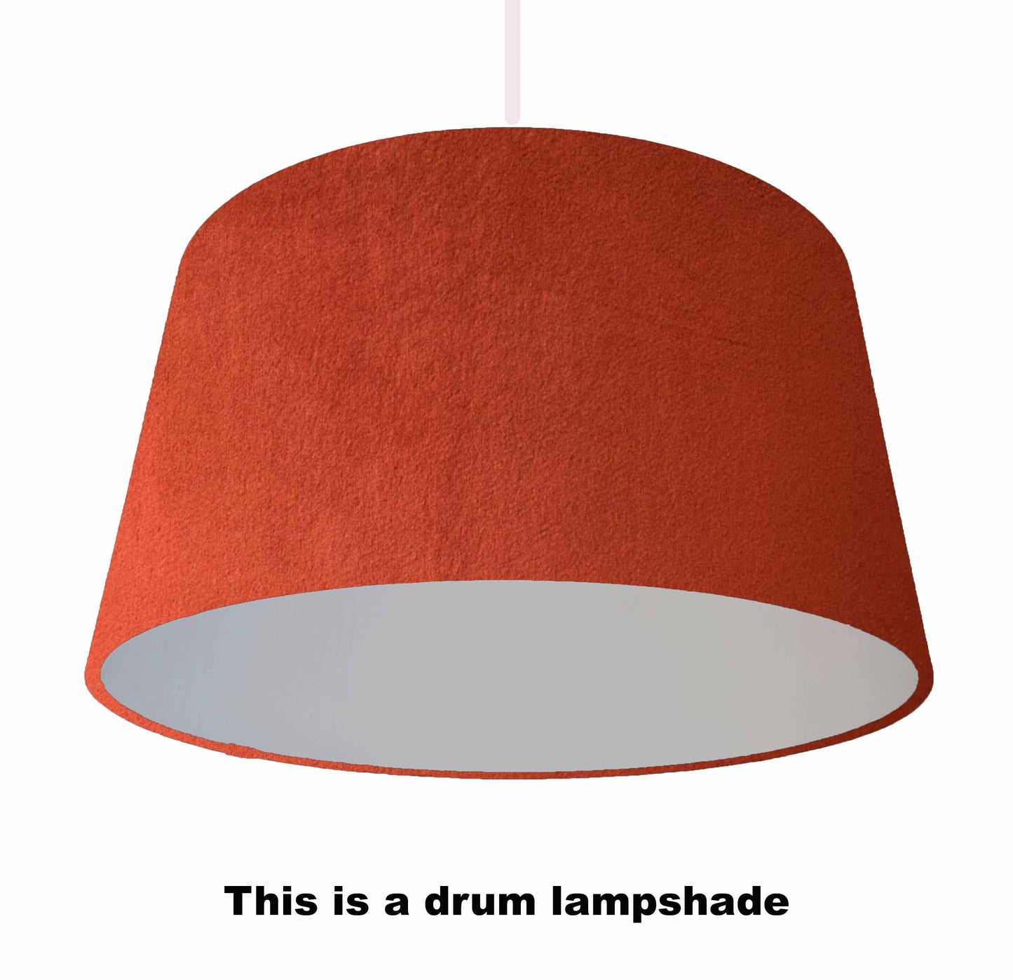 Rust orange velvet lampshade with brushed silver lining. View from ceiling light.