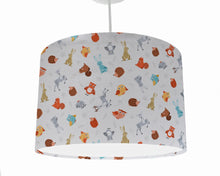 Load image into Gallery viewer, cream woodland lampshade with animals scattered on a cream background ceiling light shade
