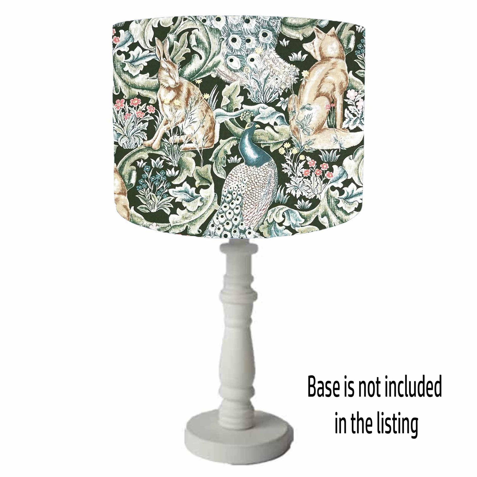Decorative drum table lamp shade with a nature-themed shade on a white background