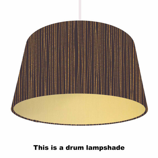 Drum lampshade with black and copper pattern, gold lining