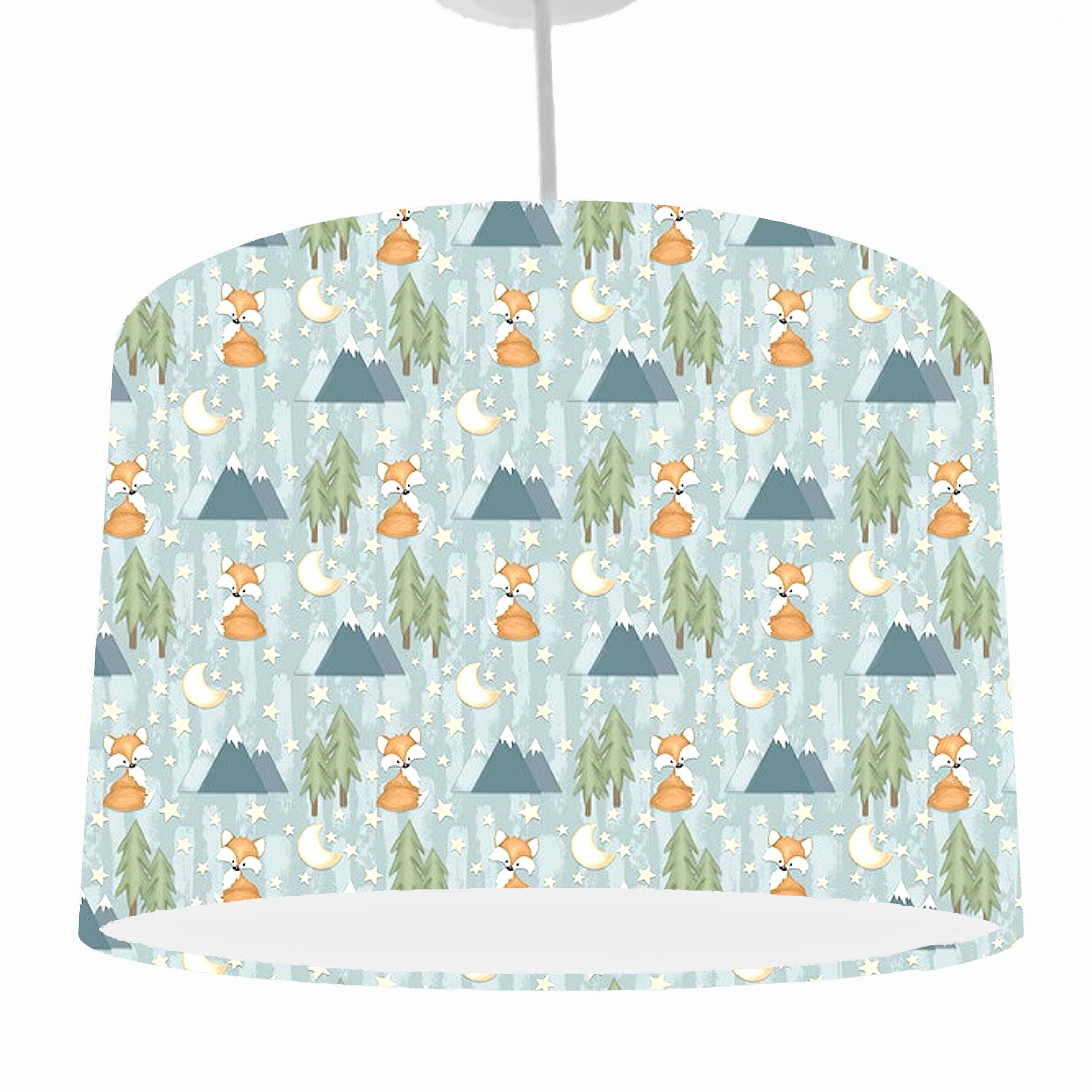 Lampshade with forest pattern featuring trees, foxes, and mountains on a light blue background.