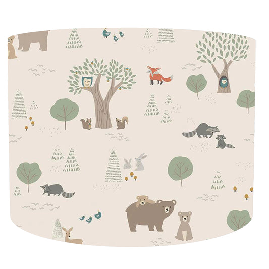 Forest animals and trees patterned drum lampshade on a beige background