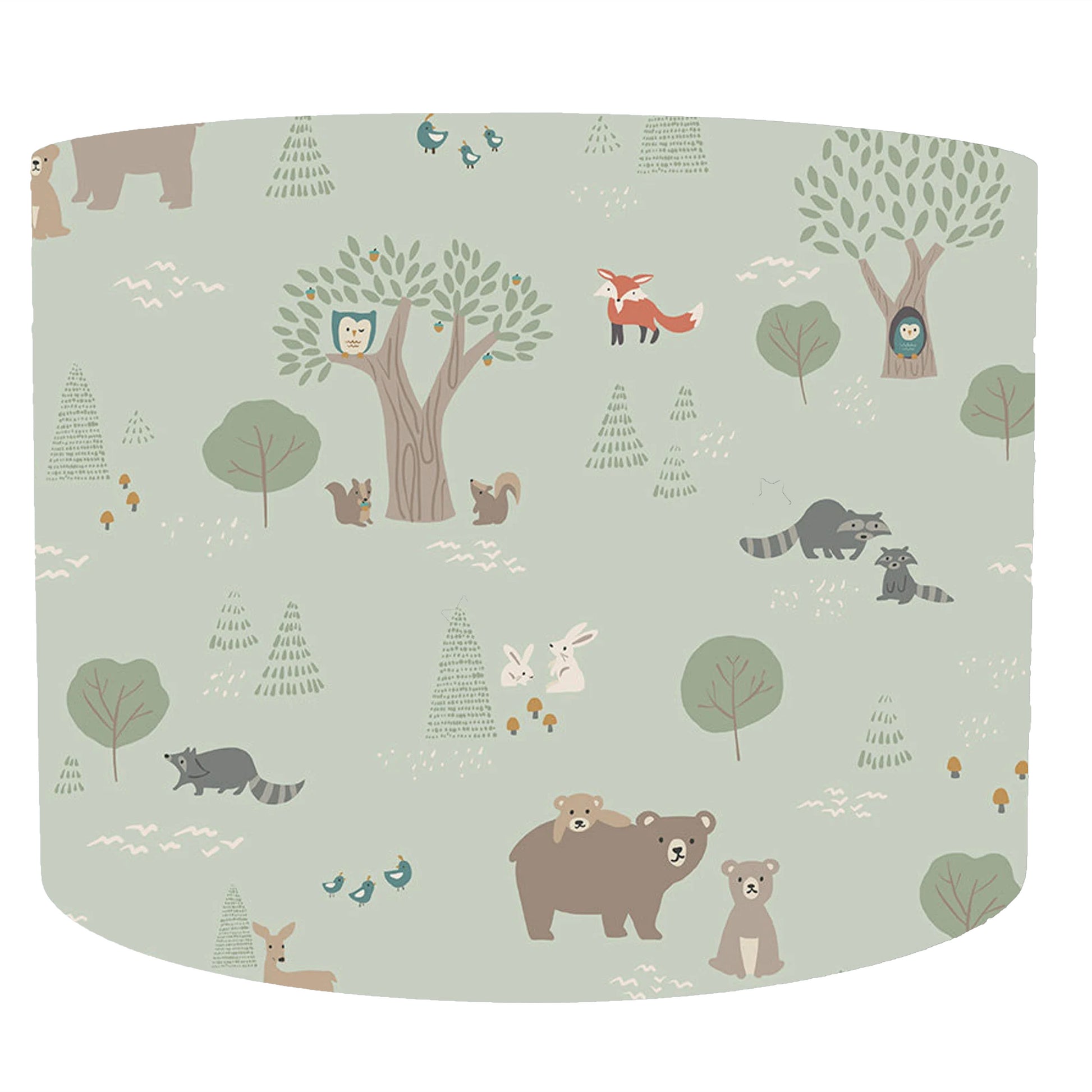 Forest animal patterned drum lampshade on a light green background