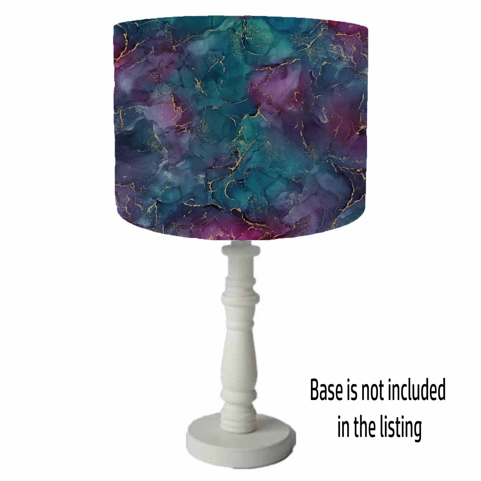 Jewelled coloured drum lampshade with shades of purple, teal and blue with gorgeous gold vien detailing. Table light view