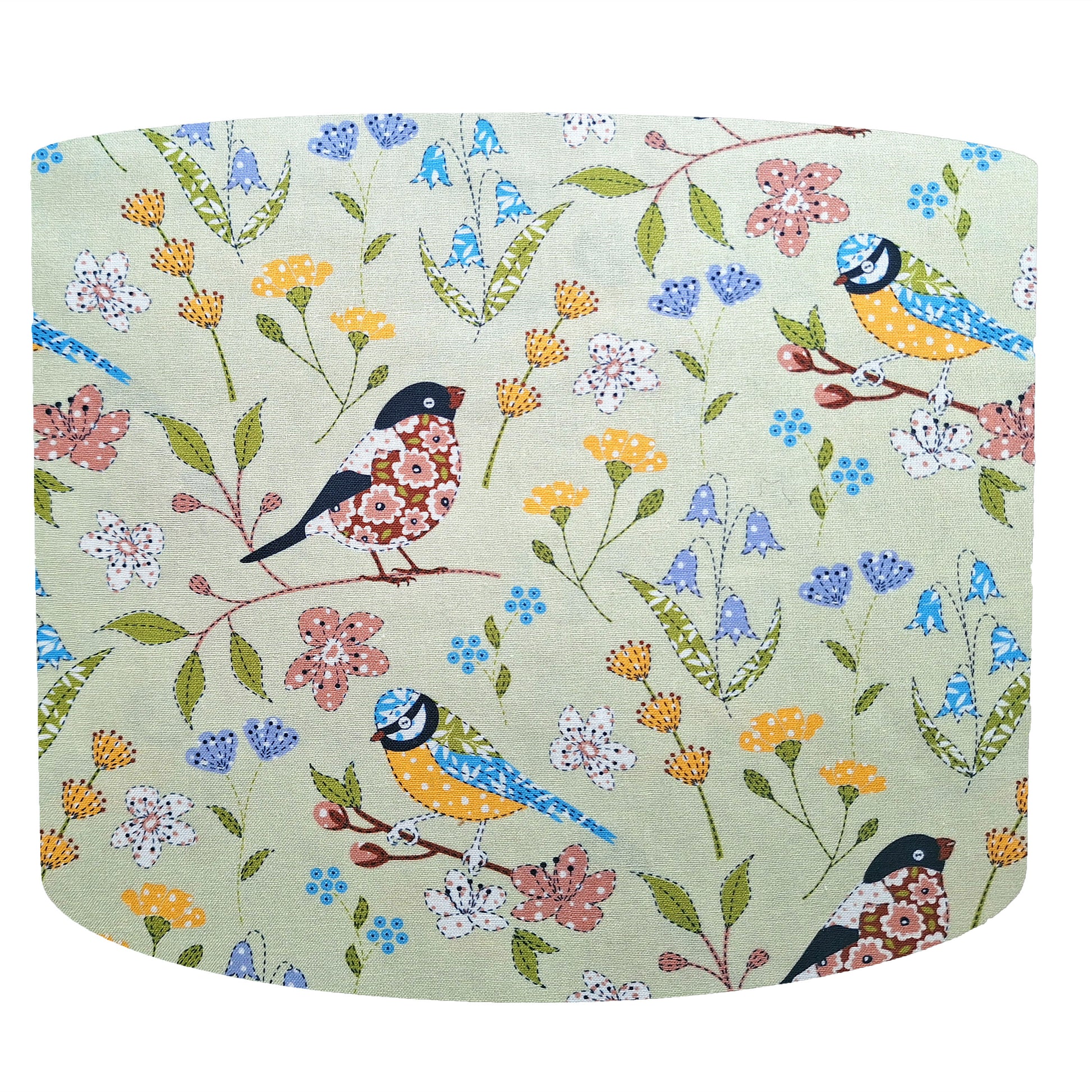 Colourful birds drum lampshade set on a floral green background. Front view