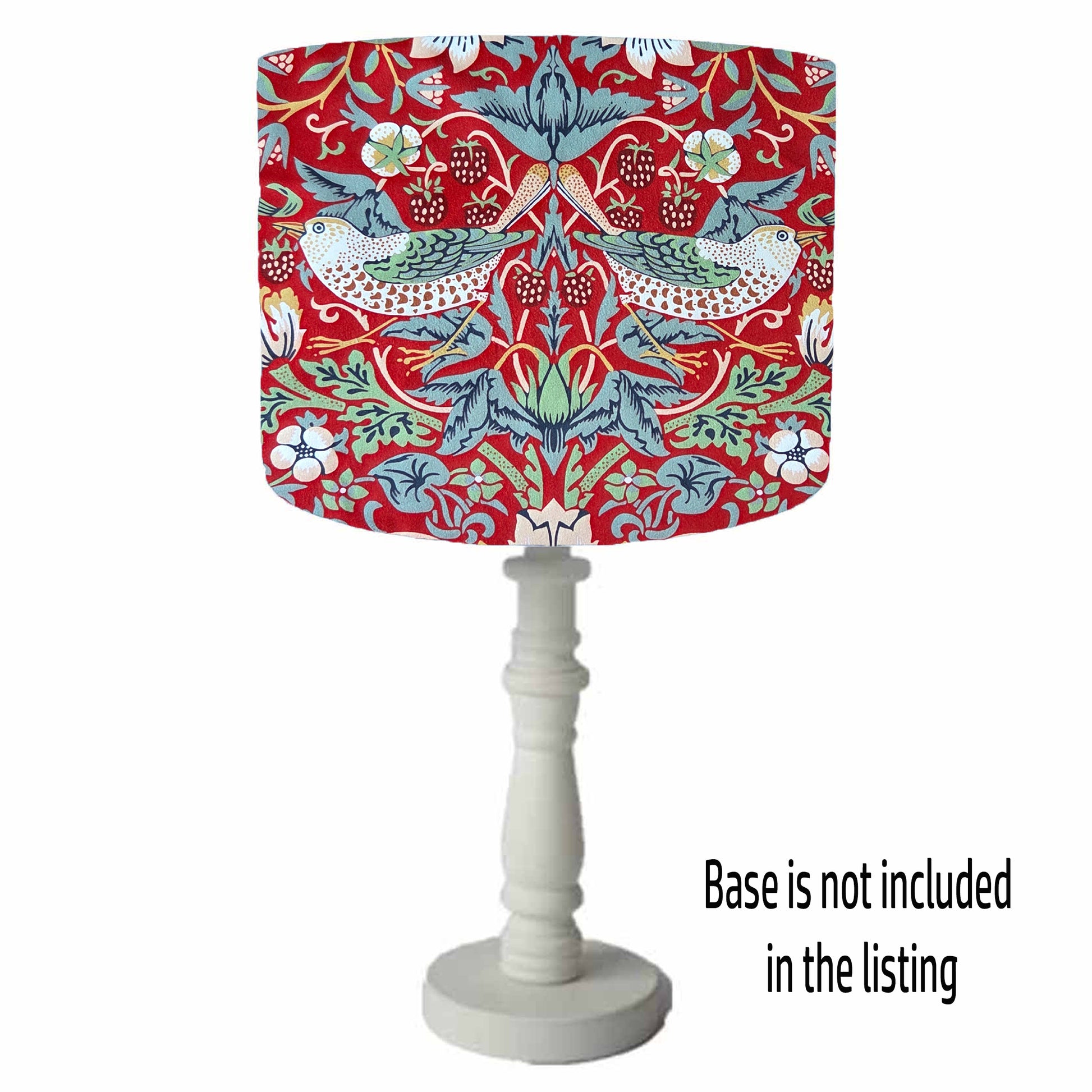 william morris strawberry thief table lamp with a colorful red velvet patterned shade on a white background
