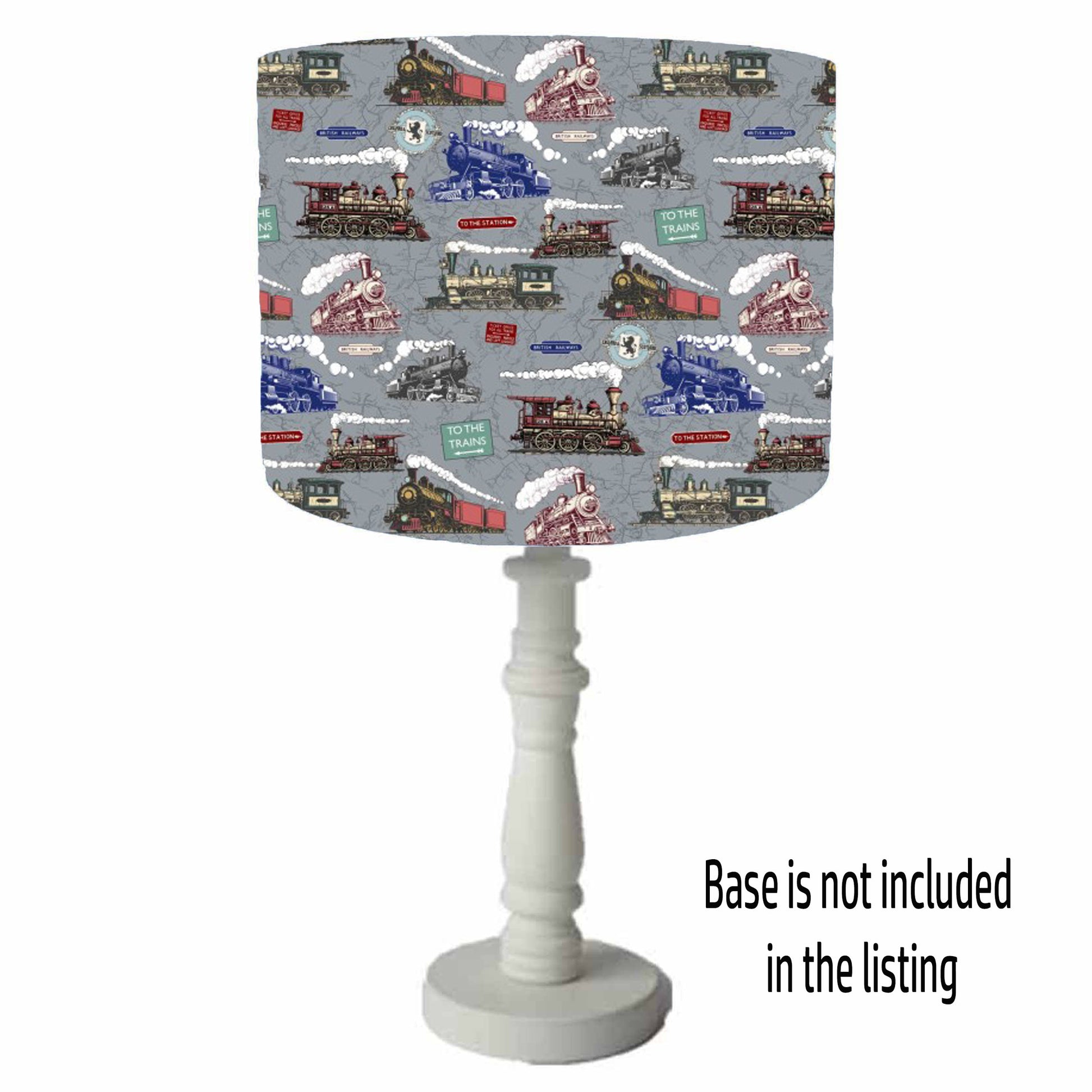 grey table lamp shade with colourful steam trains