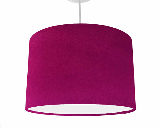 Fuchsia velvet drum ceiling light shade, hanging from the ceiling view