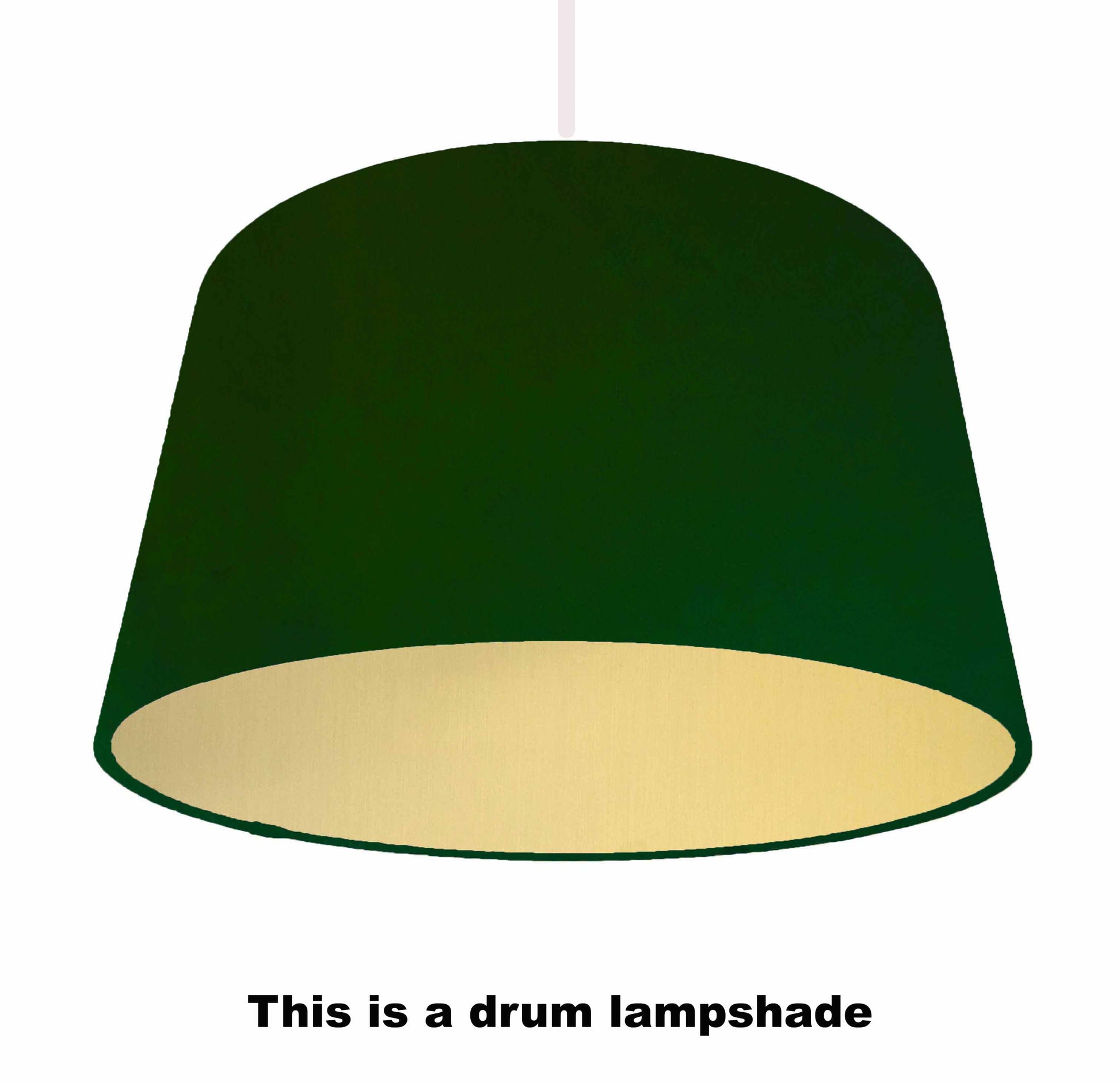Dark green velvet drum lampshade with metallic gold lining, ceiling light view
